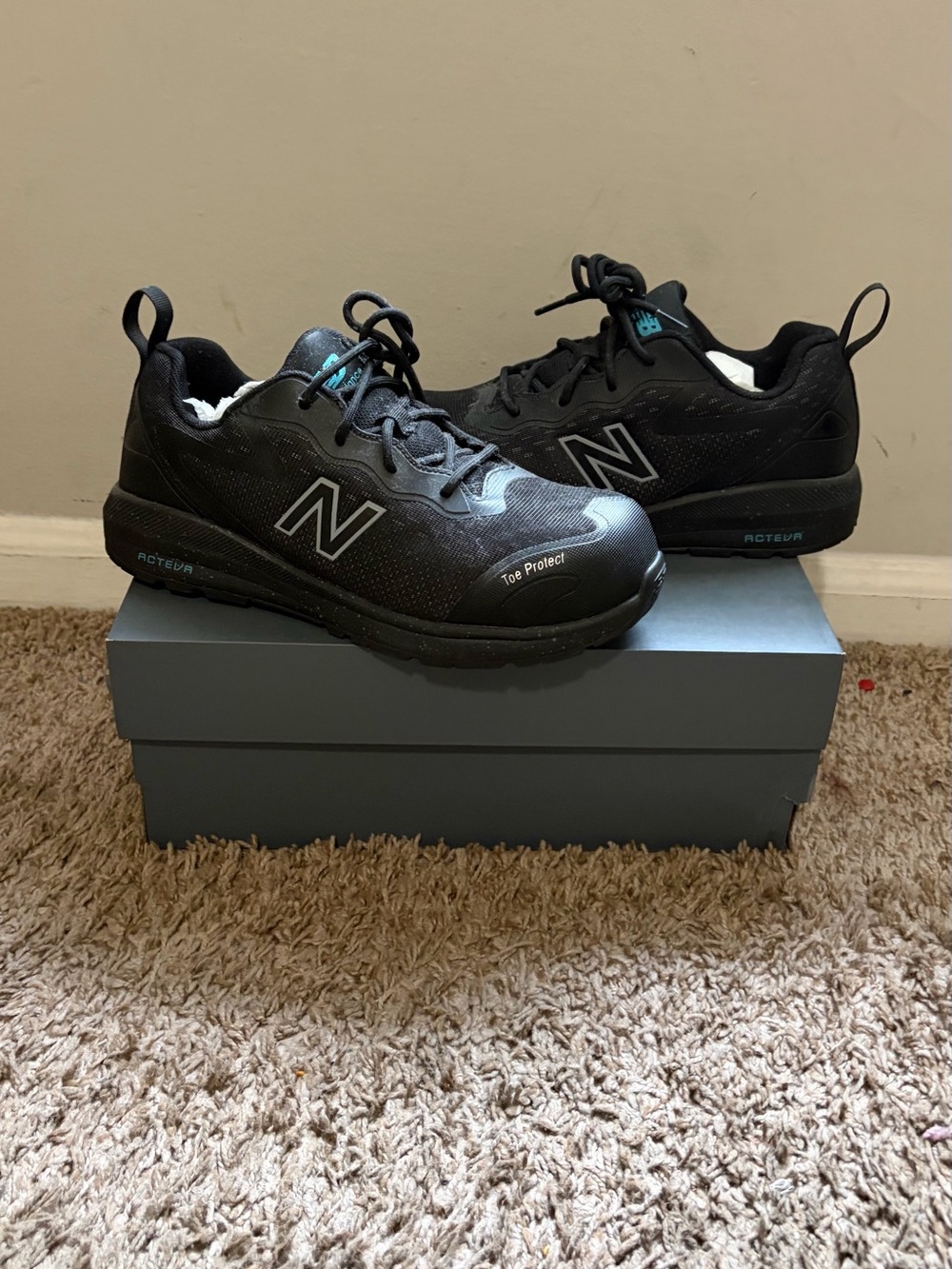 New Balance women’s Black Athletic Sneakers with Reflective N Logo